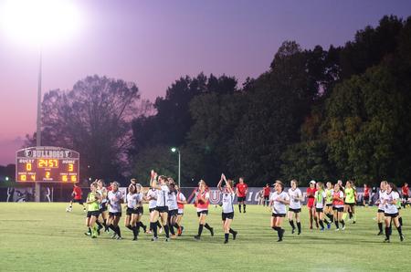 The Lady Bulldogs celebrate victory over Spring Hill College during Family Weekend. - Photo by Jess Newendyke
