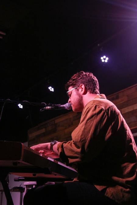 Students play music during Open Mic Night.  - Photo by Hannah Heckart