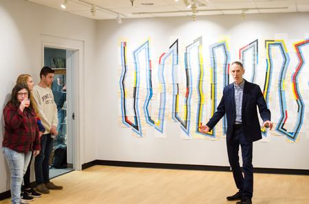 Gene Schmidt gives a gallery talk in the Union Art Gallery. - Photo by Jess Newendyke