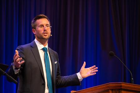 Craig Dismuke, chief economist at Vining Sparks and Union alum, speaks in chapel. - Photo by Hannah Heckart