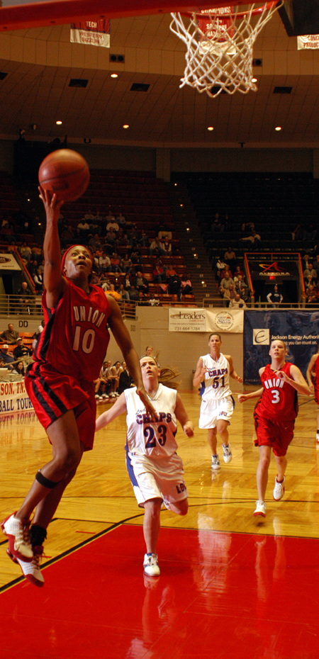 Ena Daniels (10) finishes a fast break with a layup during Union's 77-55 win in the first round of the 2005 NAIA National Tournament. - Photo by Morris Abernathy