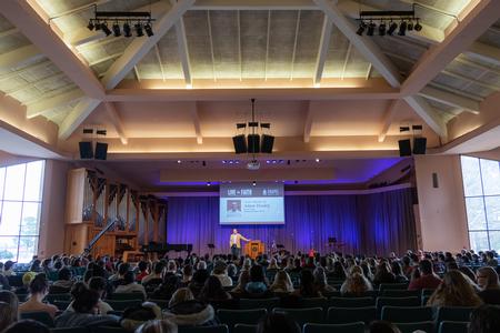 Adam Dooley, senior pastor at Englewood Baptist Church, speaks in chapel. - Photo by Joey Echeverria