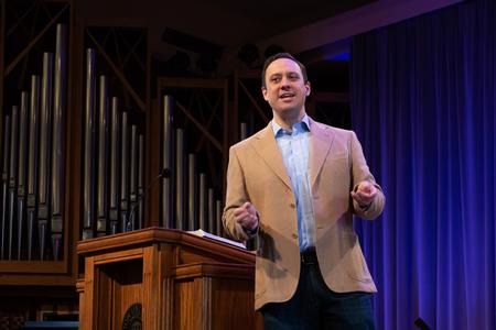 Adam Dooley, senior pastor at Englewood Baptist Church, speaks in chapel. - Photo by Joey Echeverria
