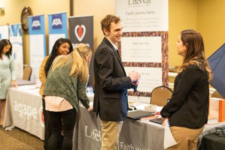 Students chat with recruiters during the Career Fair in the Grant Events Center. - Photo by Kristi McMurry Woody