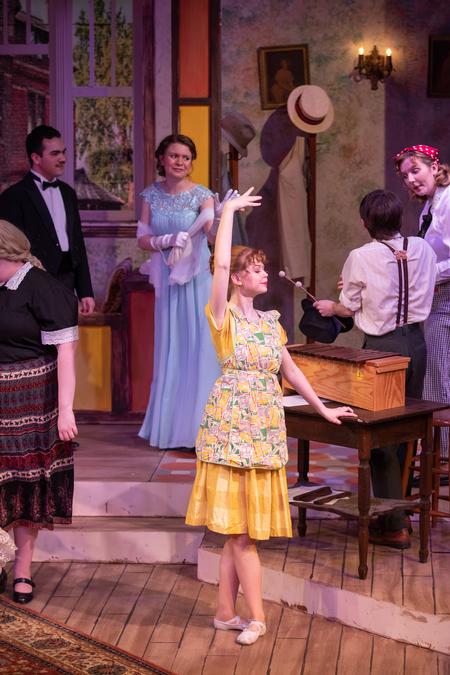 Sullivan Hogan (foreground), theatre major, performs as Essie in the UU Theatre production of "You Can't Take It With You." - Photo by Kristi McMurry Woody