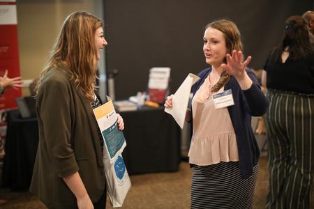 Shelby Titsworth, interdisciplinary studies major, chats with a recruiter during the Education Expo.  - Photo by Kristi McMurry Woody