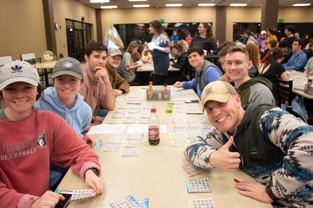 Students gather in the Brewer Dining Hall for the Student Activities Council bingo event. - Photo by Hannah Heckart