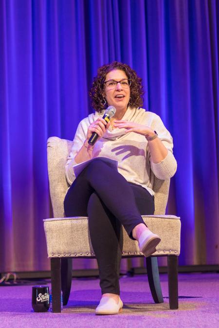 Erin Slater, director of the center for academic success, answers questions on a panel during chapel. - Photo by Nikki Grim