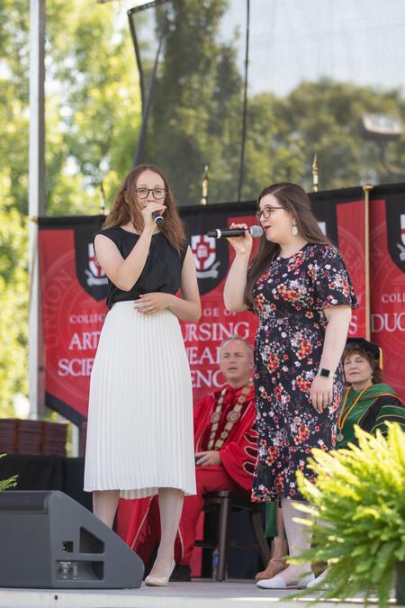 Shelby Morris and Kaylen Williams, music education graduates, perform special music during Spring Commencement. - Photo by Kristi McMurry Woody