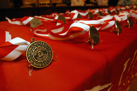 Members of the class of 1955 each received a special 50th Reunion medallion during Homecoming. - Photo by Morris Abernathy