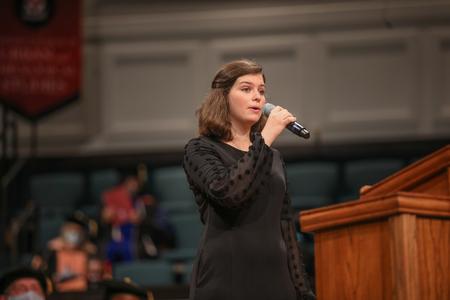 Leah Campbell, music education major, performs special music during summer graduation. - Photo by Kristi McMurry Woody