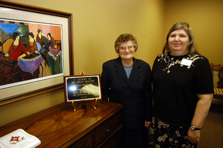 Garvalene & Jeannie Byrd pose in the newly renovated faculty lounge named in honor of their husband/father Eldon Byrd.  - Photo by Morris Abernathy