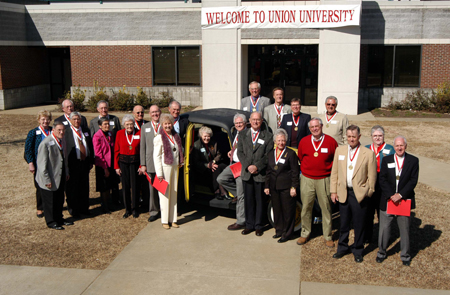 Members of the class of 1955 posed with a classic car during their 50th year class reunion. - Photo by Morris Abernathy