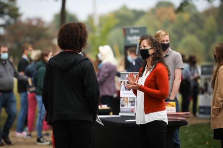 Joy Moore, assistant director for the honors community, talks to prospective students during Day at the U. - Photo by Kristi McMurry Woody