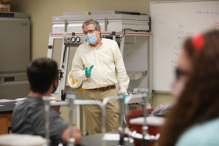 William Thierfelder, associate professor of biology, gives instructions for a lab. - Photo by Kristi McMurry Woody