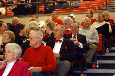 President Dockery enjoys the Homecoming basketball games along with many other Bulldog boosters. Seated in front of Dr. Dockery is former president Hyran Barefoot. - Photo by Morris Abernathy