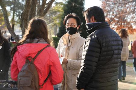 Esther Choi, assistant professor of biology, talks to prospective students during Day at the U. - Photo by Sarah Palmer Goff