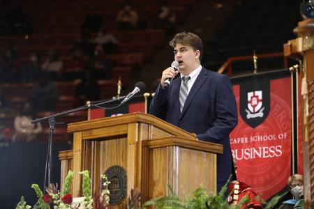 Nicholas Zerfoss, music performance major, sings during Fall Graduation. - Photo by Kristi McMurry Woody