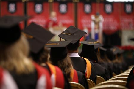 Graduates listen to the commencement address during Fall Graduation. - Photo by Kristi McMurry Woody