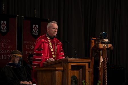 Dub Oliver, president of the university, speaks during Convocation. - Photo by Joey Echeverria
