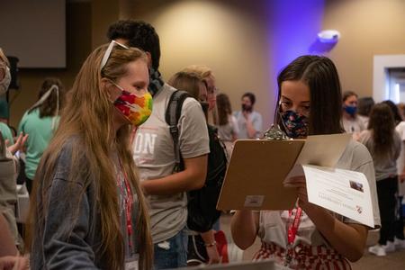 New students talk with representatives from student organizations during the Welcome Week student life fair. - Photo by Joey Echeverria