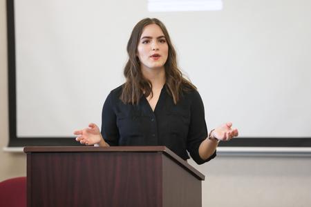 Melanie Nassif, theological studies with honors major, delivers her presentation for the Scholarship Symposium. - Photo by Kristi McMurry Woody