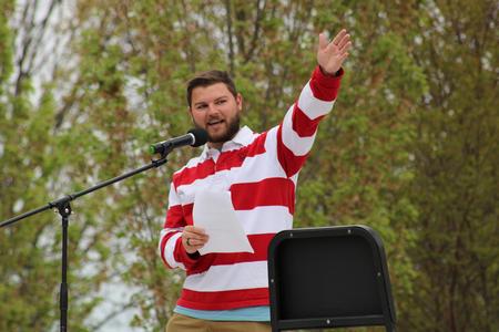 Grant Gammon, business administration major, introduces performers at SAC's Rock the Block. - Photo by Abigail Aspinwall