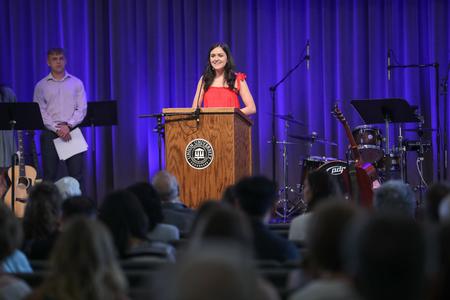 Madison Hari, accounting graduate, speaks during the Graduation Commissioning Service. - Photo by Kristi McMurry Woody