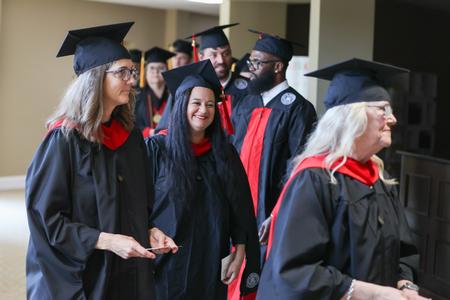 Students prepare to process into Summer Commencement.

Photo by Song Kim. - Photo by Kristi McMurry Woody