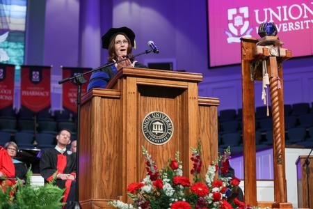 Theresa Blakley, retired professor of social work, delivers the commencement address. - Photo by Kristi McMurry Woody