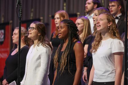Students sing during Convocation. - Photo by Kristi McMurry Woody