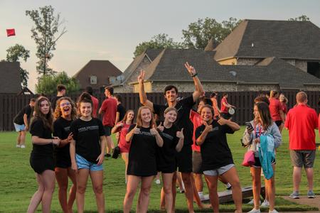Student leaders pose at Dub Oliver's home during a Welcome Week ice cream social. - Photo by Abigail Aspinwall