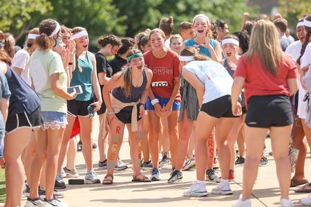 Ladies of Rogers hype themselves up prior to the Residence Life 1/2K event. - Photo by Kristi McMurry Woody