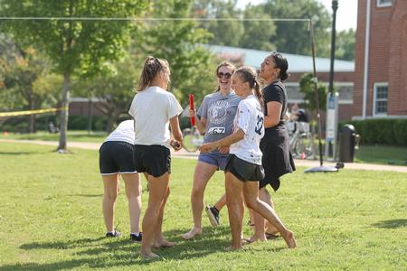 Students celebrate after finishing the Residence Life 1/2K with other members of their building. - Photo by Kristi McMurry Woody