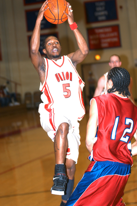 Marcus Cooper (5) drives past a Lyon College defender in Union's TranSouth Conference Tournament Championship game win. - Photo by Jonathan Blair