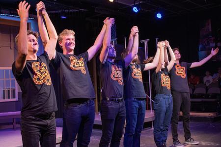 Blank Slate Improv takes a bow after their Family Weekend performance.  - Photo by Abigail Aspinwall
