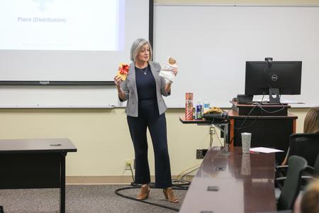 Brooke Emery, associate professor of marketing, teaches a class in the BAC. - Photo by Kristi McMurry Woody