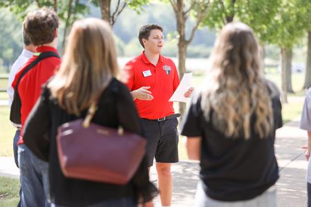 Student ambassador Evan Holt leads a tour during Day at the U. - Photo by Kristi McMurry Woody