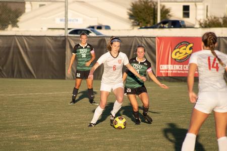 The lady bulldogs compete against Delta State University during Community Night. - Photo by Abigail Aspinwall