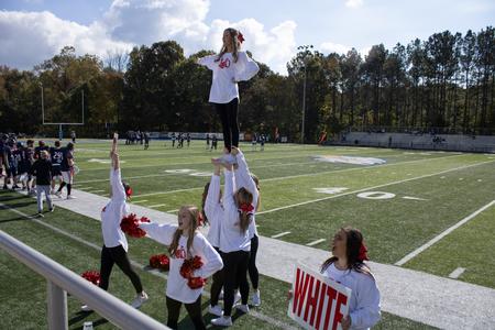 The Union Cheerleaders cheer at the Buster Bowl during Homecoming 2021. - Photo by Abigail Aspinwall