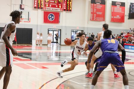Justin Debuck plays in the Homecoming 2021 game against Bethel University. - Photo by Kristi McMurry Woody