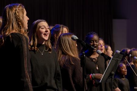 Students sing in the Fall Jazz Band Concert in the chapel. - Photo by Cade Smith