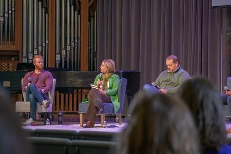 Student Life staff members answer questions on a panel during chapel. - Photo by Faith Orr