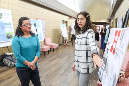 Maria Wentley, art major, presents her research on typography during Fall Poster Sessions. - Photo by Kristi McMurry Woody