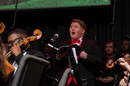 Kolby Atkins, music major, performs in Handel's Messiah in the chapel. - Photo by Cade Smith