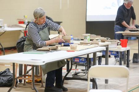 Jan McKeachie Johnston and Randy Johnston, ceramic artists, teach a workshop for Union art students. - Photo by Kristi McMurry Woody