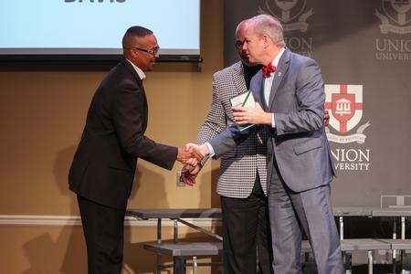 The late Kimmie Powell Davis, a prominent philanthropist and pastor in West Tennessee, was honored by Barry Chaney, Davis’ successor as the pastor of New Life Christian Center, and Elder Elvis Hollis, Davis’s godson. - Photo by Kristi McMurry Woody