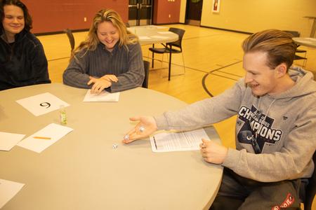 Students play Bunco during a J-term Res Life event. - Photo by Abigail Aspinwall