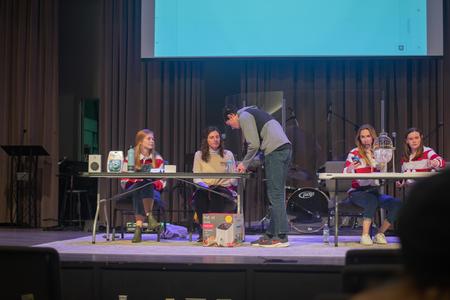 Student Activities Council leads a game of bingo in the chapel. - Photo by Faith Orr