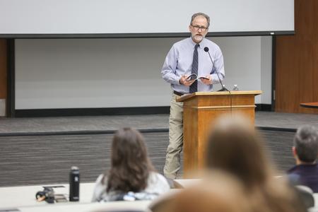 Bobby Rogers, professor of English and writer in residence, reads from his new collection of poetry, "Shift Work." - Photo by Kristi McMurry Woody
